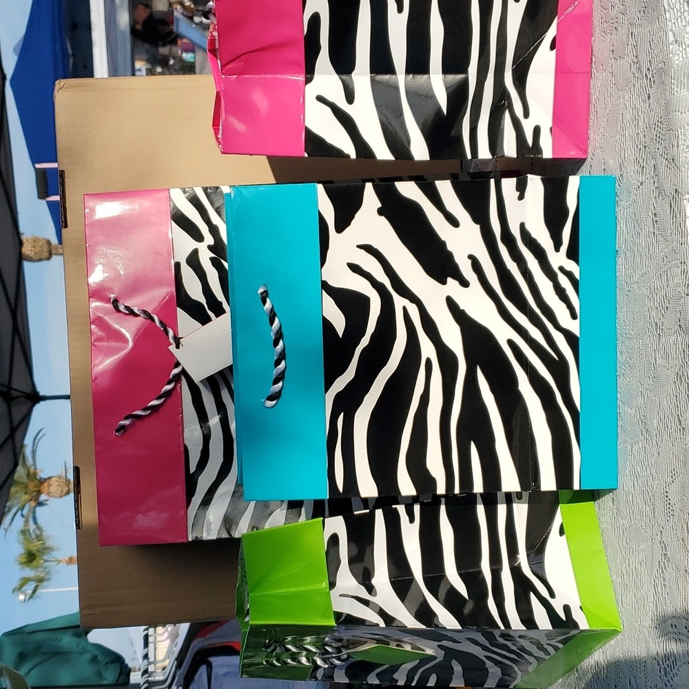 4 colorful Zebra print Gift Bags set- 1 large 3 medium with tissue paper New